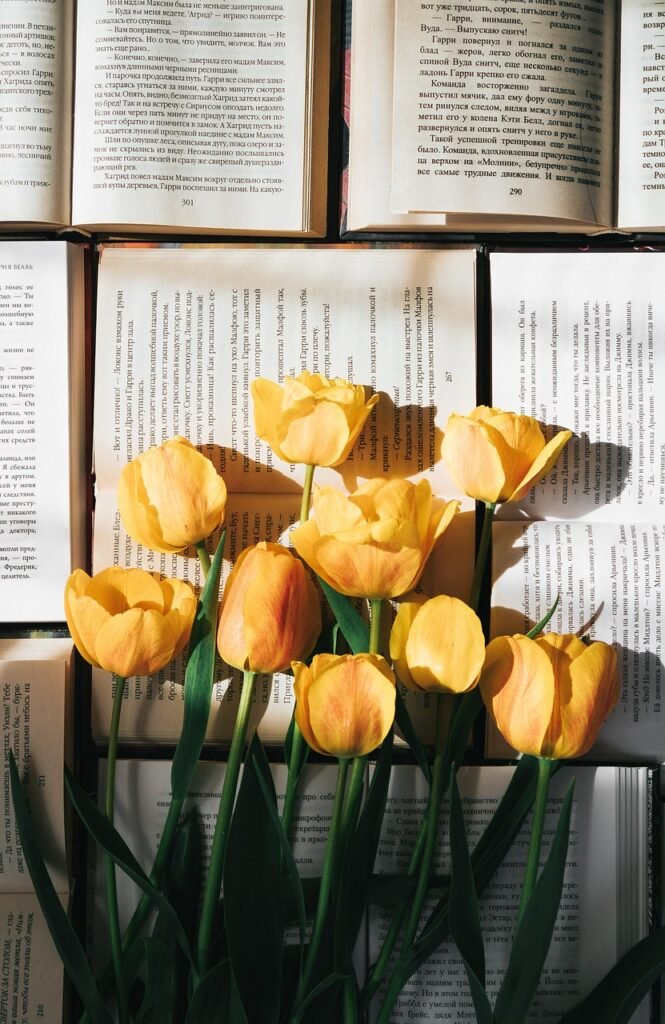 tulips, flowers, books, read, nature, flower background, flower wallpaper, page, yellow tulips, yellow flowers, spring, literature, closeup, beautiful flowers, phone wallpaper, aesthetic wallpaper